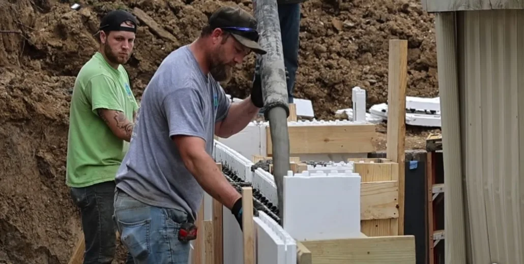 JLB crew on site: ICF foundation pour in progress at Baxter, IA project