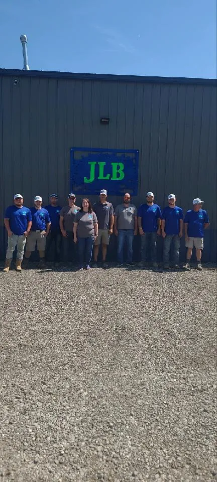 JLB Foundation Repair headquarters: team photo at company building