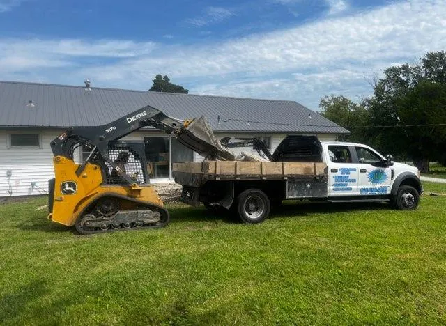 JLB Foundation Repair arrives at every Shawnee job site fully equipped — truck, tools, and skid steer