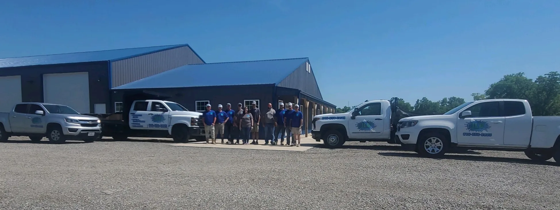 JLB Foundation Repair and Waterproofing warehouse exterior and truck fleet