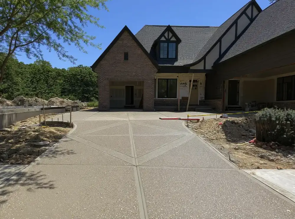 Exposed-aggregate concrete driveway — driveways by JLB in Waukee, Iowa