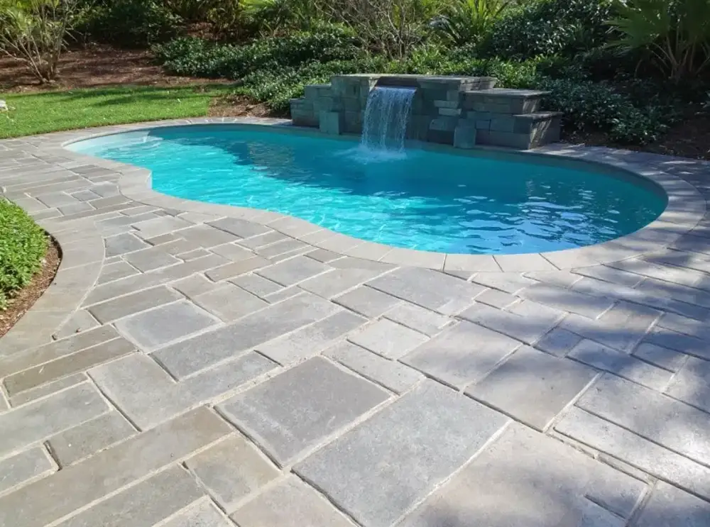 Slate-look concrete pool deck — pool decks by JLB in Clive, Iowa