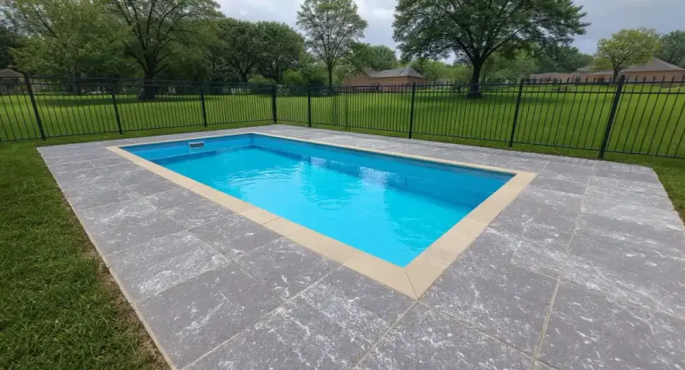 Slate-textured stamped concrete pool deck — pool decks by JLB in Clive, Iowa