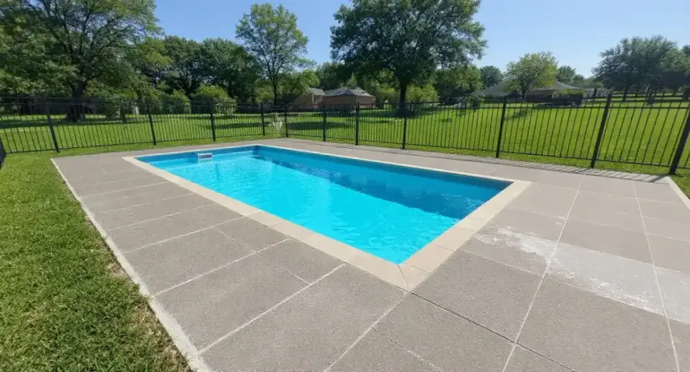 Wide concrete pool deck with expansion joints — pool decks by JLB in Clive, Iowa
