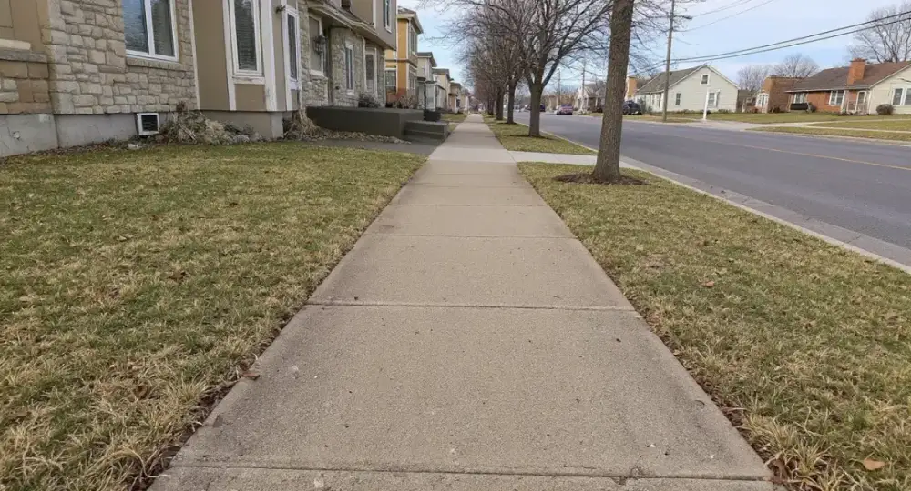 Concrete sidewalk along a residential street — sidewalks by JLB in Grimes, Iowa