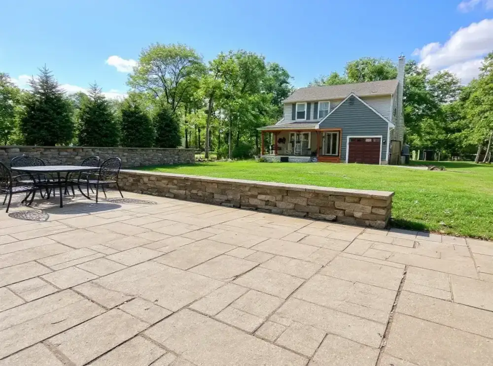 Exposed-aggregate stained patio — stained concrete by JLB in Ames, Iowa