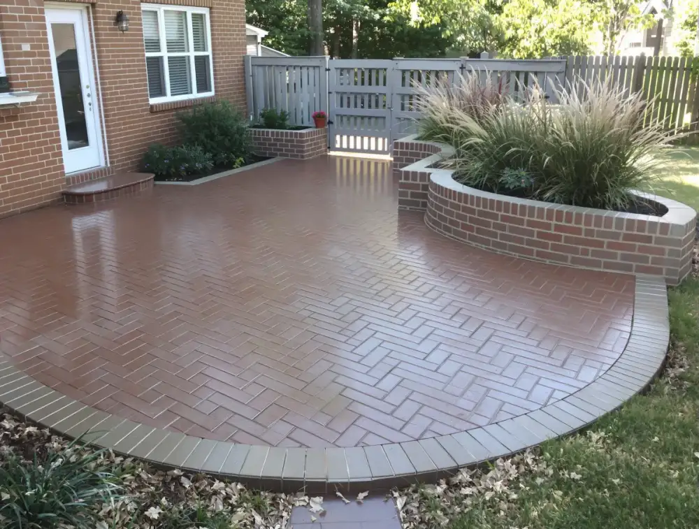 Brick-pattern stamped concrete — stamped concrete by JLB in Altoona, Iowa