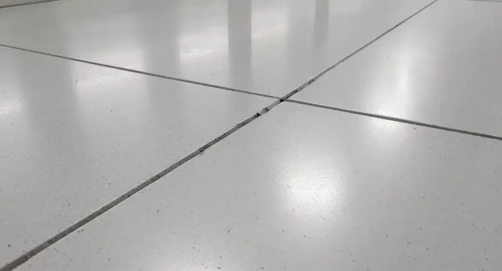 Industrial concrete floor slab with a control joint — industrial floors by JLB in Altoona, Iowa