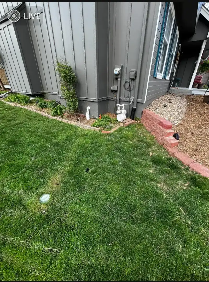 French drain installation with graded yard trench in Des Moines, IA area