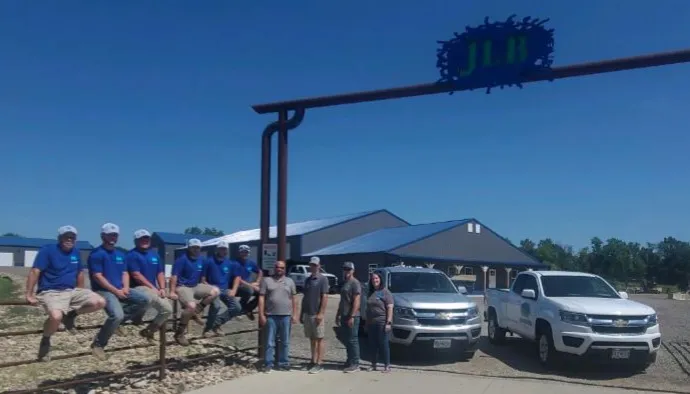 Full JLB Foundation Repair team with service vehicles in Story County