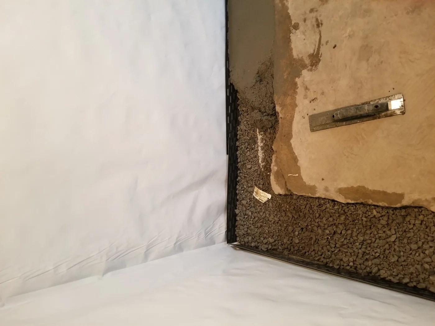 Interior drain tile and sump basement waterproofing in Eldora, Iowa