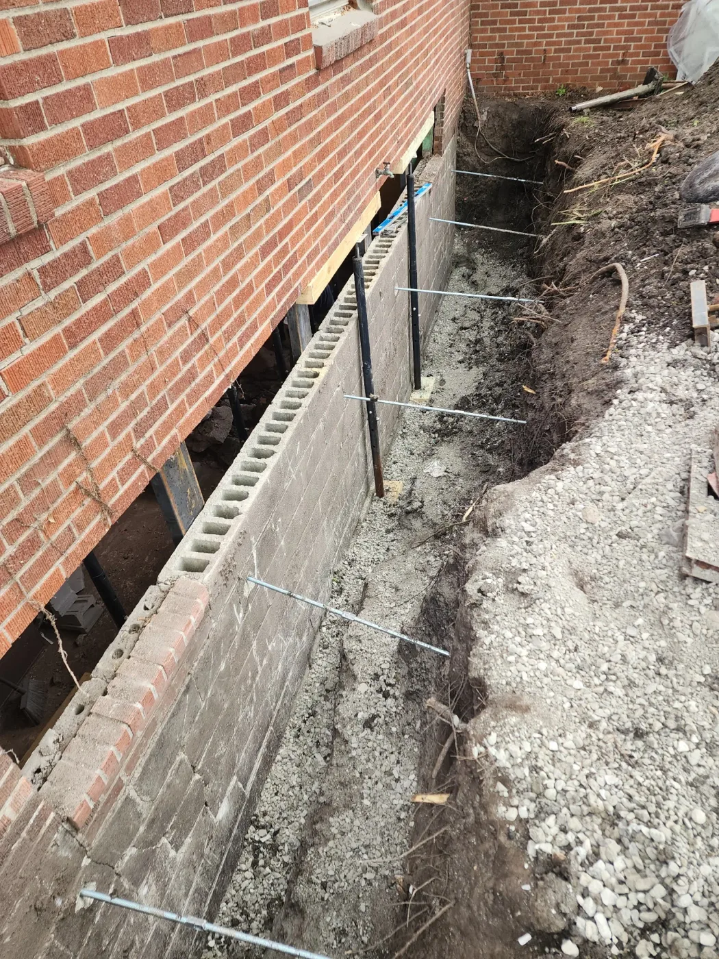 Steel-reinforced foundation wall replacement in Eldora, Iowa