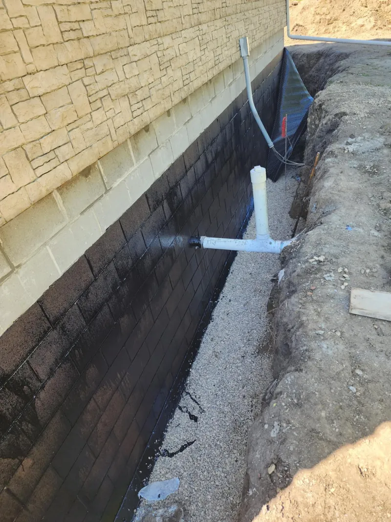 Steel push pier stabilization for a settling foundation in Prairie Village, KS