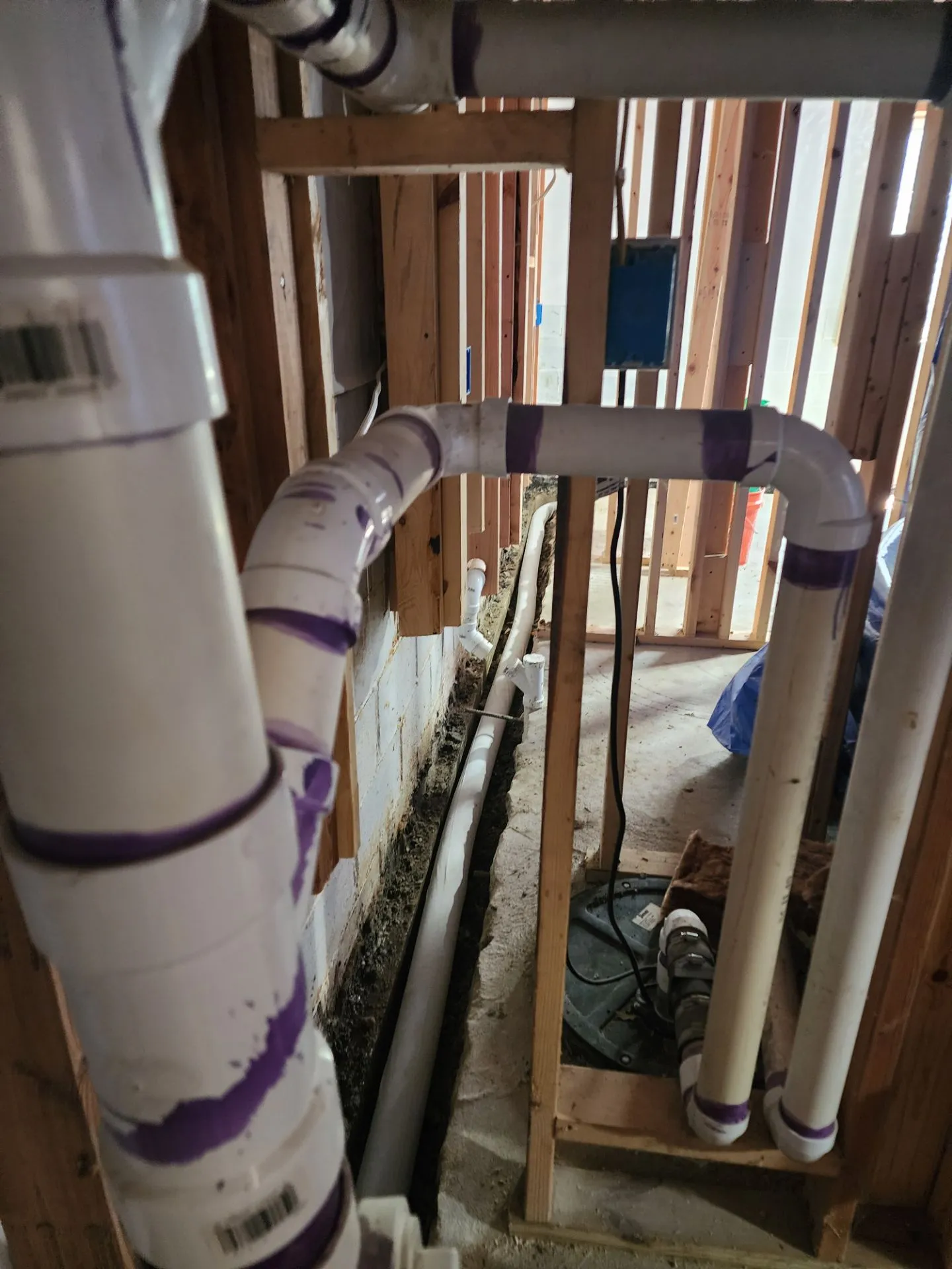 Basement waterproofing system installation in a Des Moines home